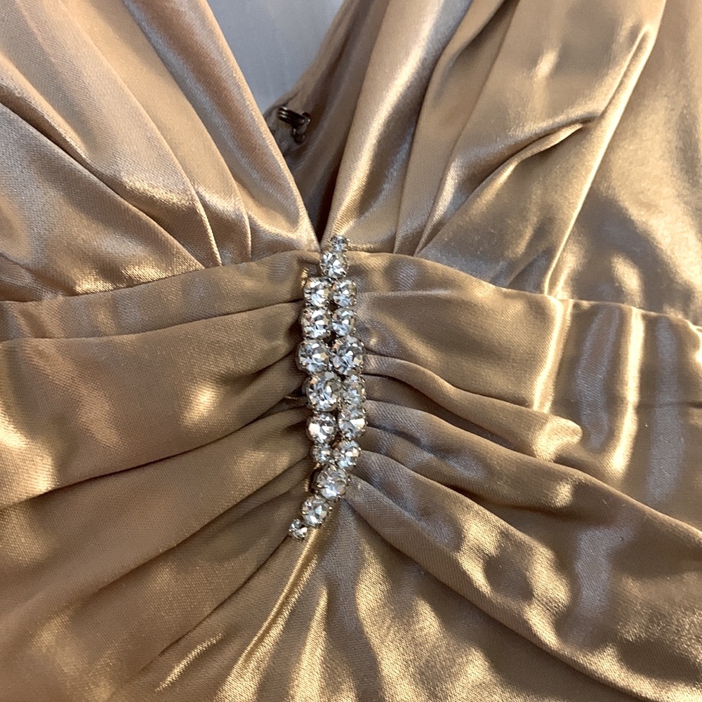 Gorgeous Morgan & Co. champagne cocktail dress with diamond design piece.